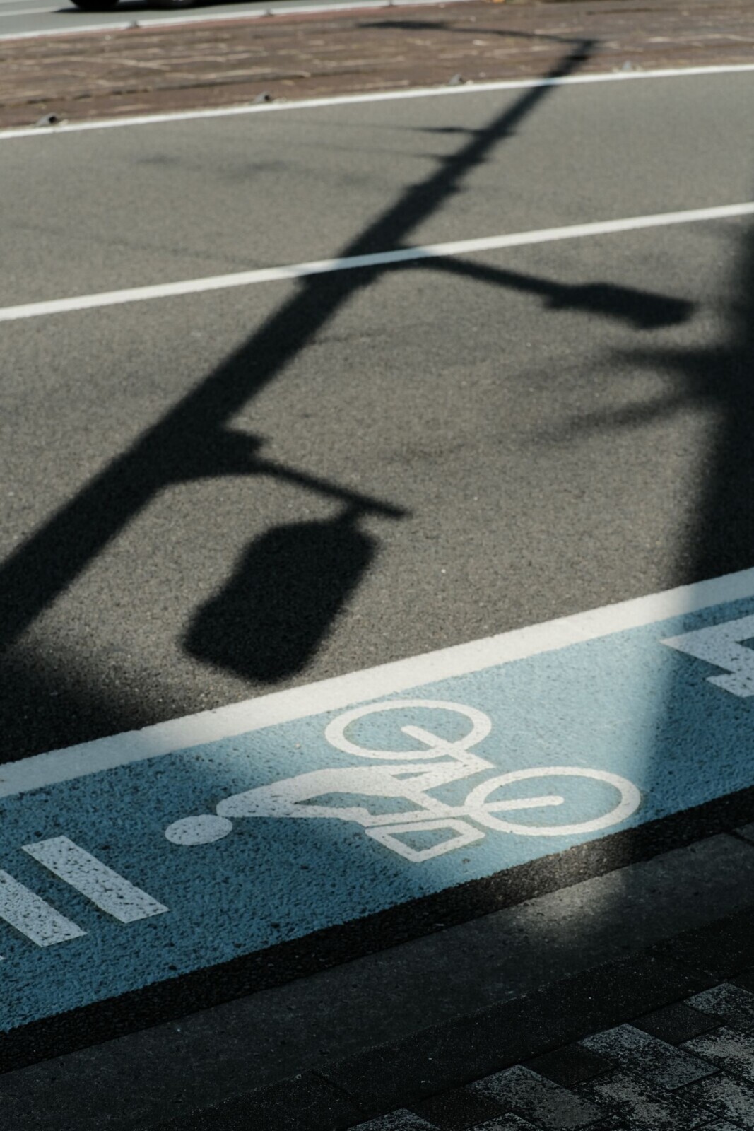 Bicycle lane symbol painted on a city street