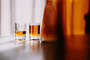 Glasses of whiskey representing drunk driving