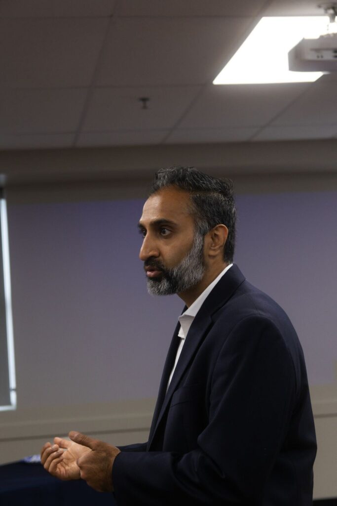 Furqan Mohammed speaking to students and parents at the first annual Muslim Pre-Law Conference at CPSA in Lombard