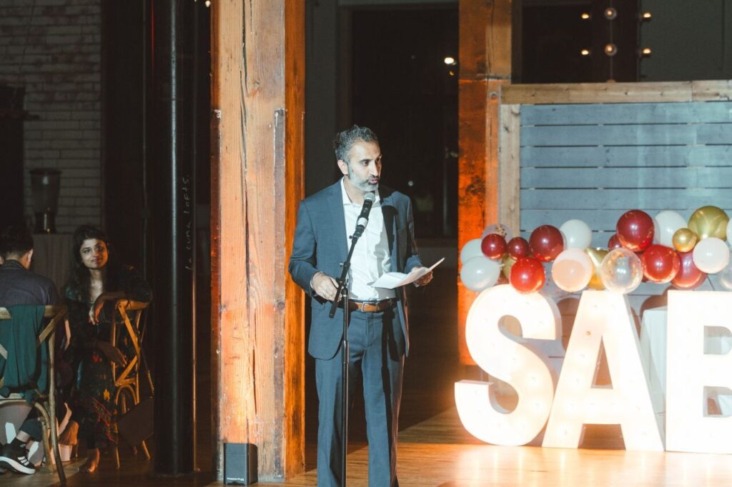 Furqan Mohammed delivering his acceptance speech at the SABA Chicago 2026 Annual Gala at Lacuna in Chicago