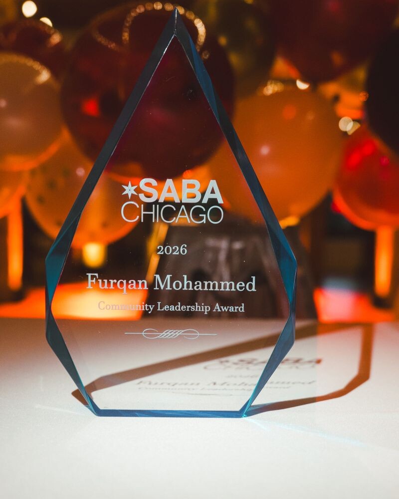 Glass SABA Chicago 2026 Community Leadership Award engraved with Furqan Mohammed's name